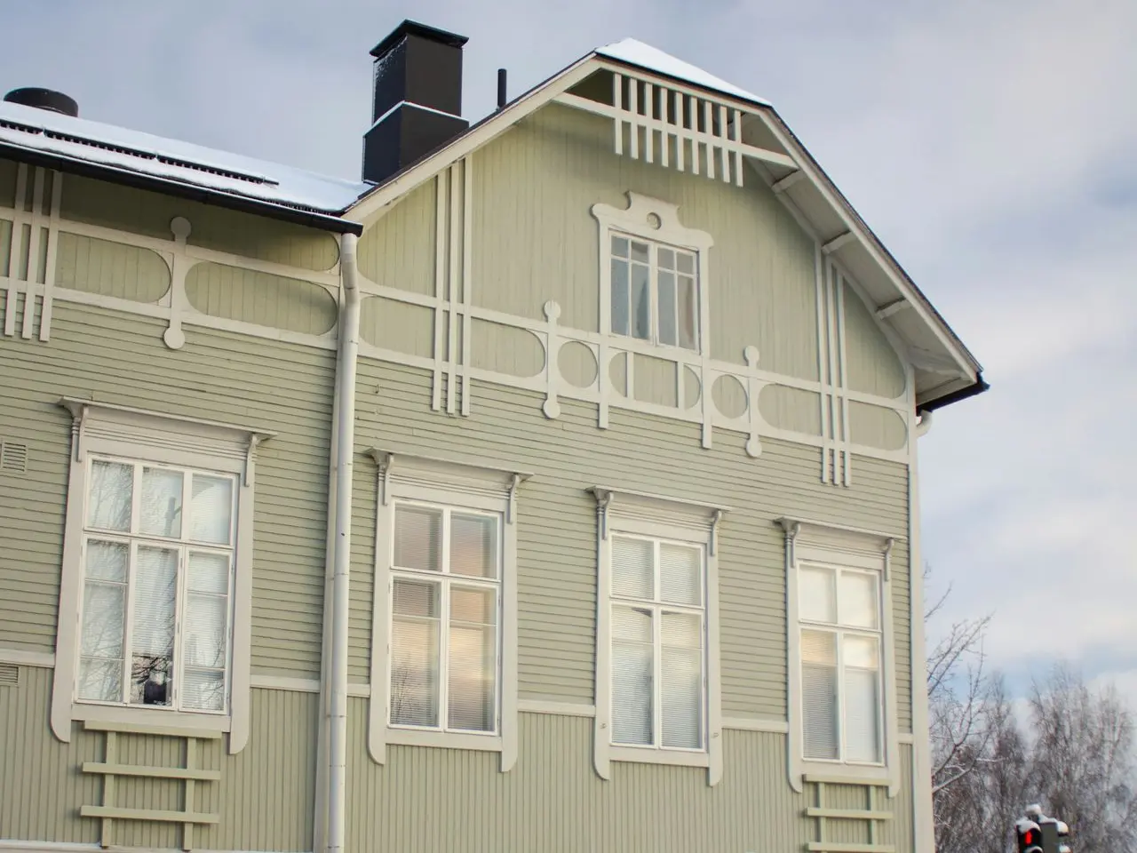 gray and white 3-storey house