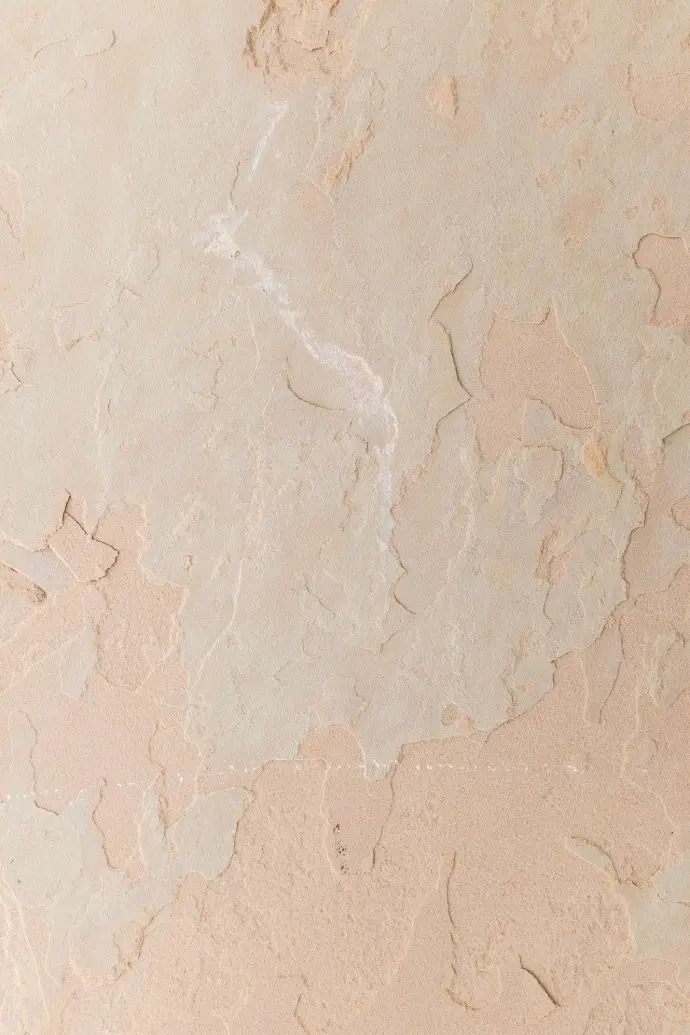 a close up of a wall with some paint on it
